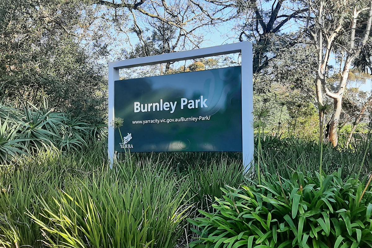 Burnley Park sign among native gardens in Burnley, Melbourne