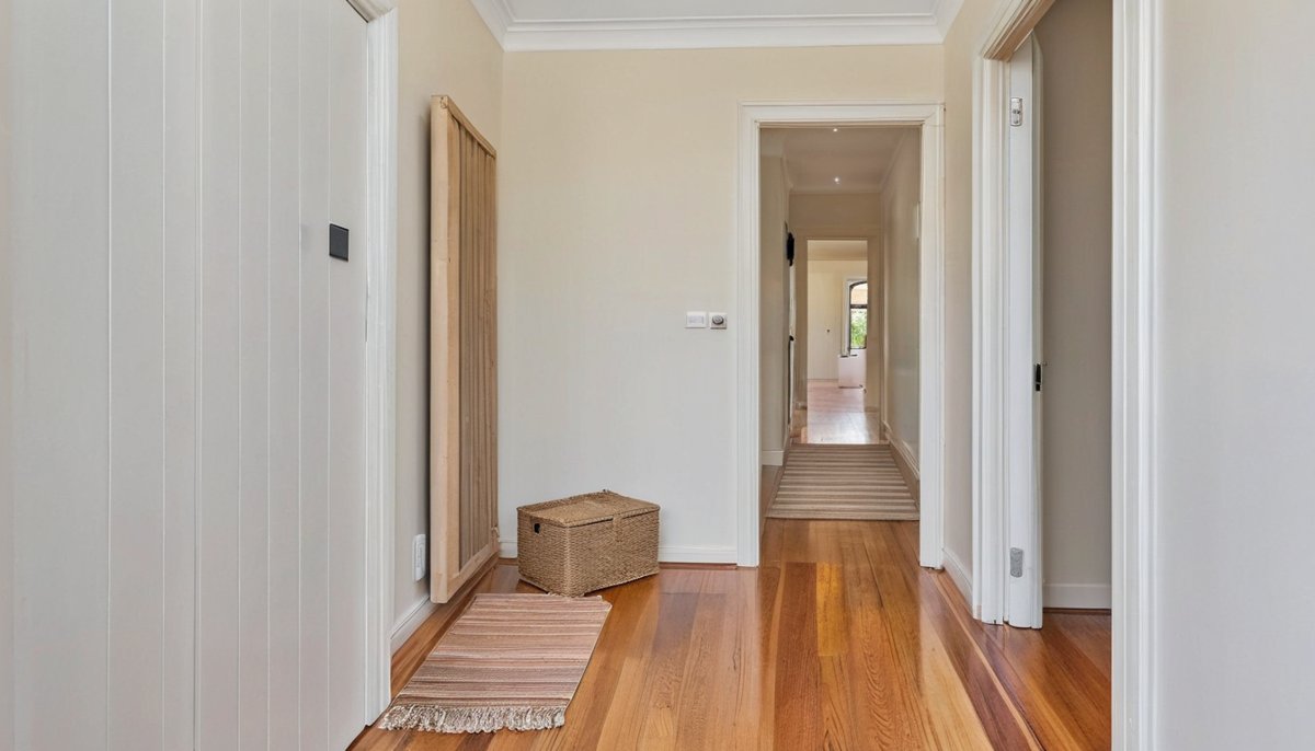 Hallway with packed moving boxes ready by the door on moving day