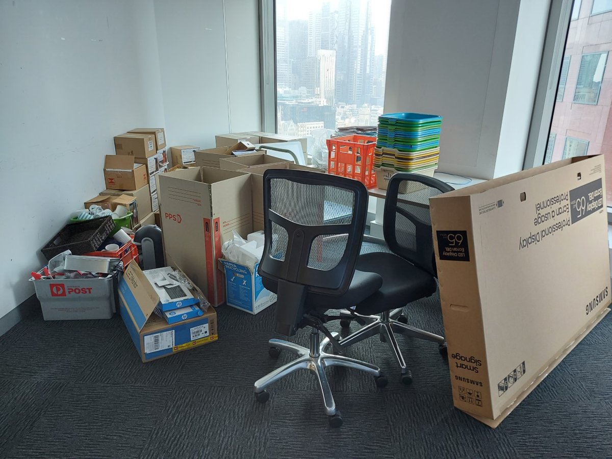 Boxes, an office chair and crates cleared from a Melbourne CBD office